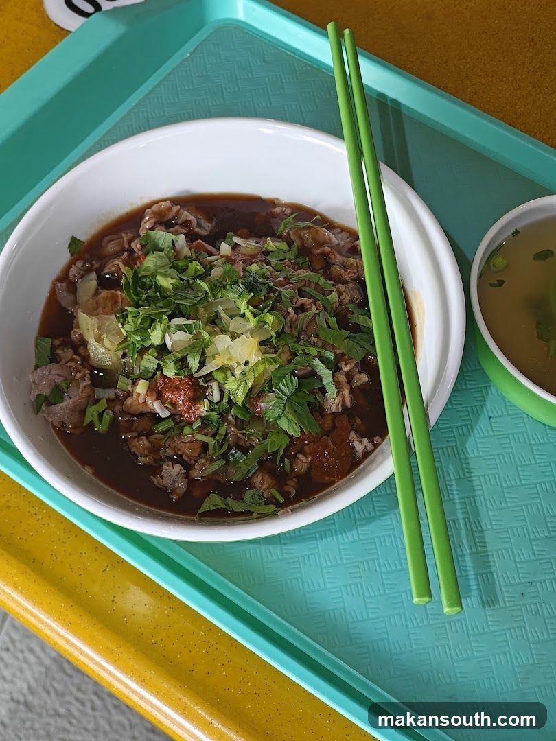 Bowl of Soup with Green Toppings