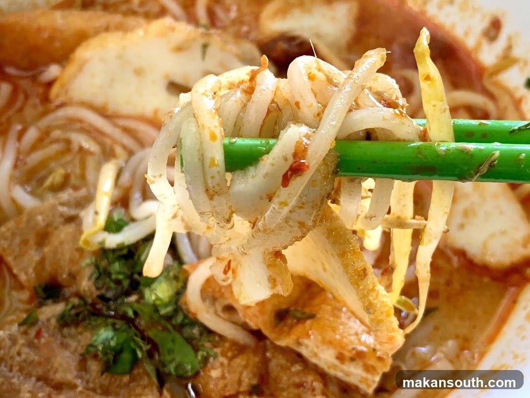 Noodle Dish with Green Chopsticks