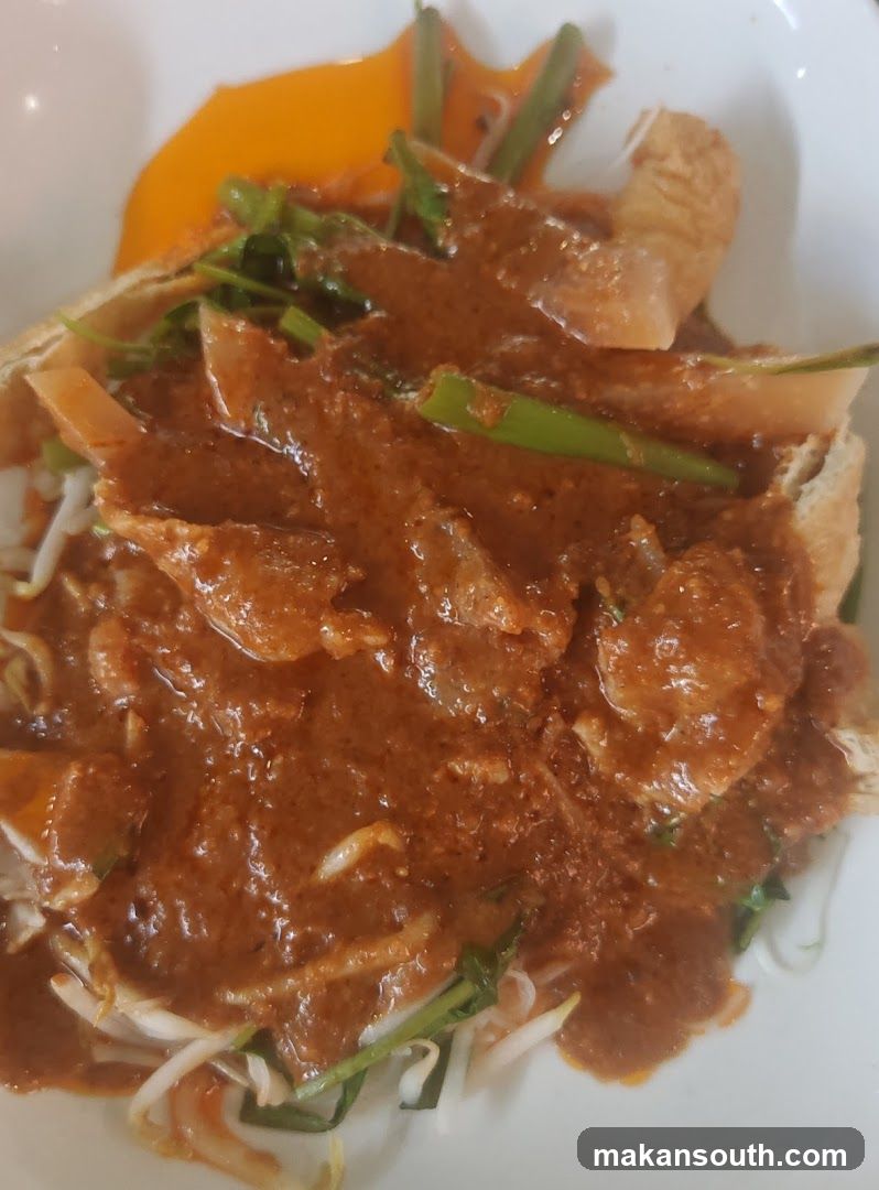 Spicy Noodle Dish with Egg Yolk