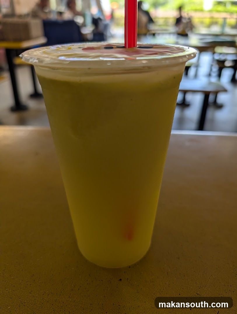 Yellow Drink in Cup