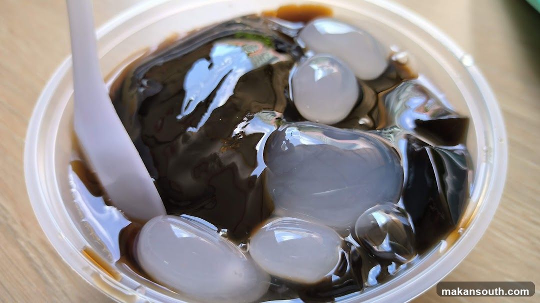 Bowl of Black Sesame Jelly with Ice Balls