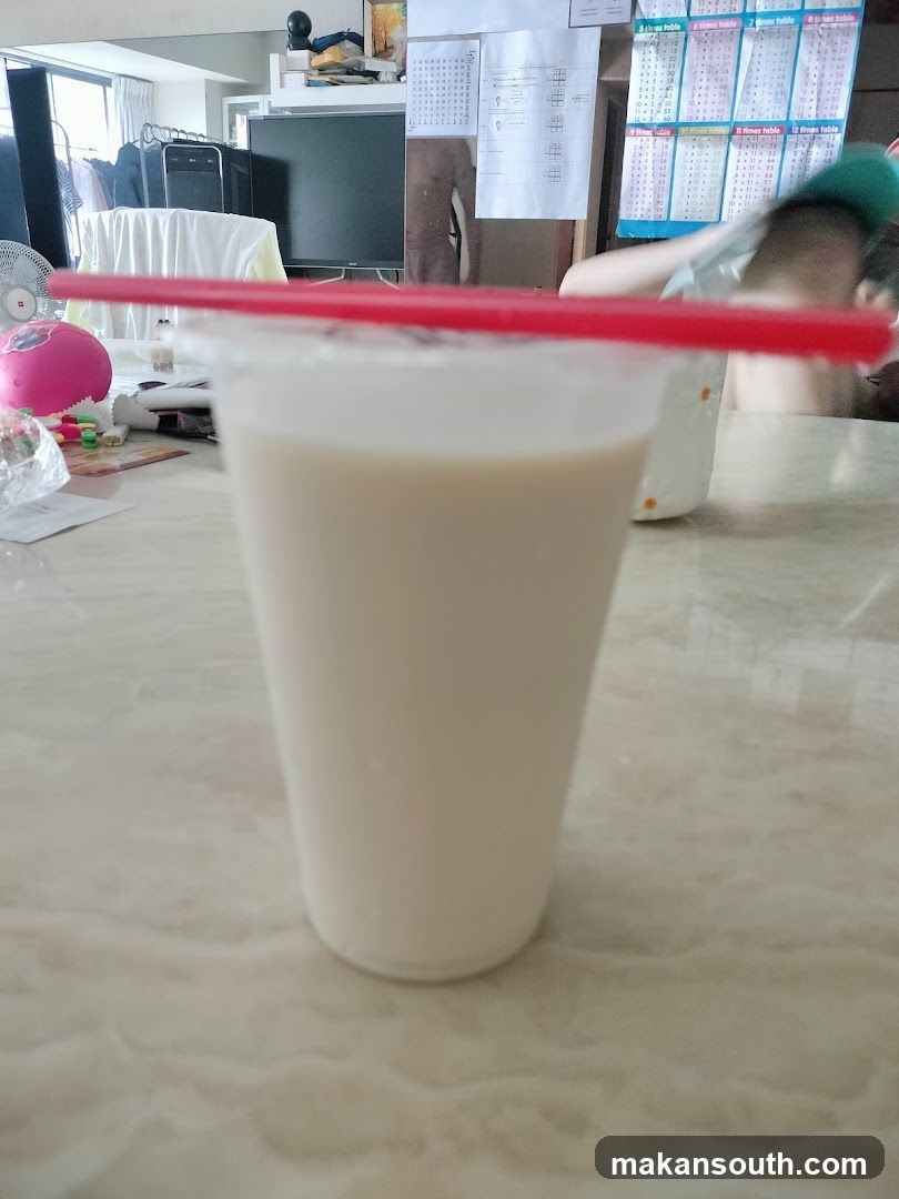 Beverage with straw on table