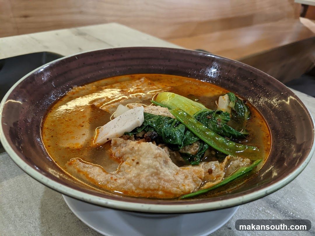 Bowl of Soup with Vegetables and Meat