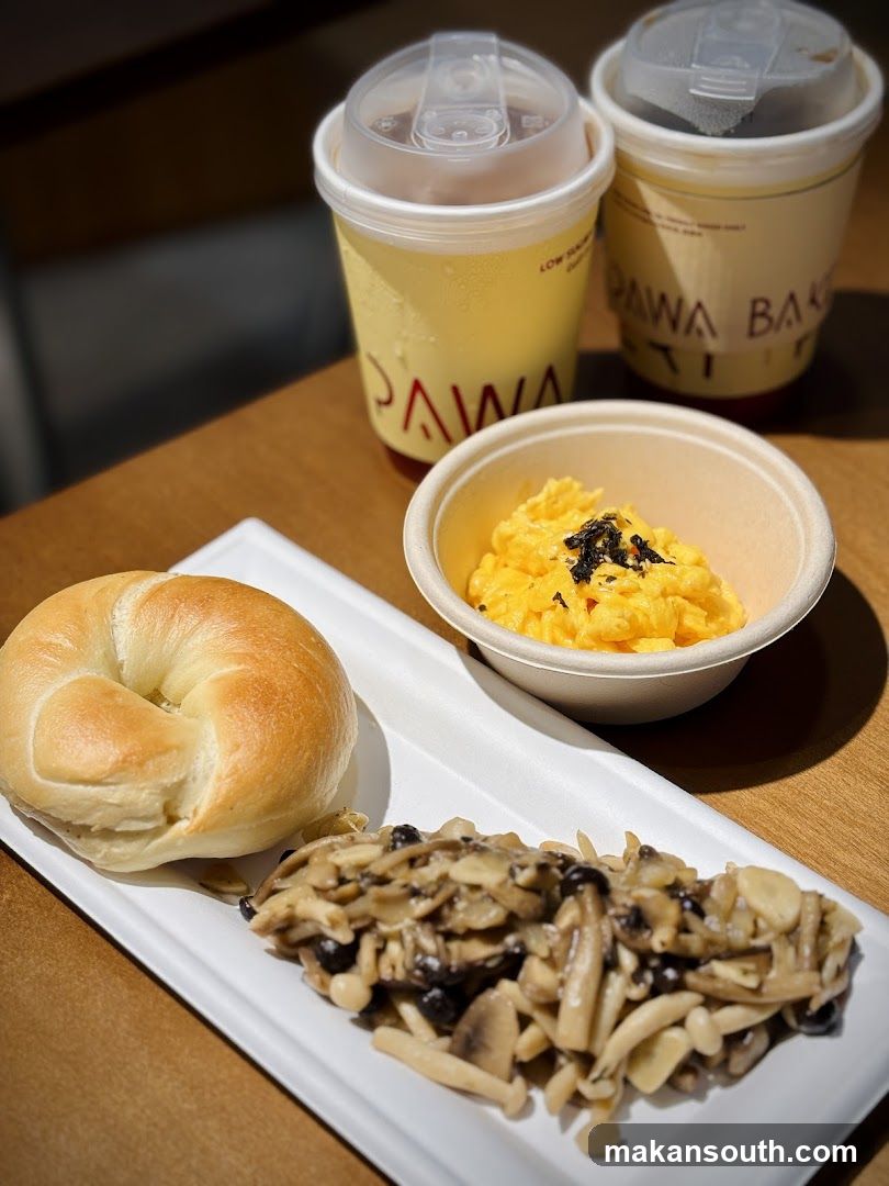 Breakfast Meal with Bagel, Scrambled Eggs, and Mushrooms
