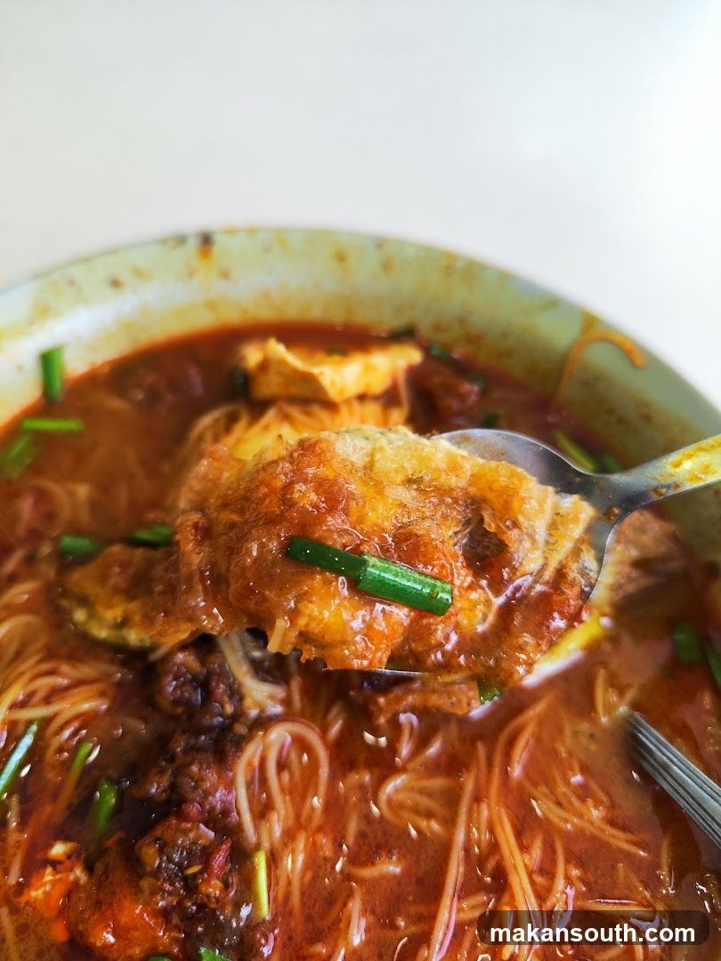 Spicy Noodle Dish with Fried Egg