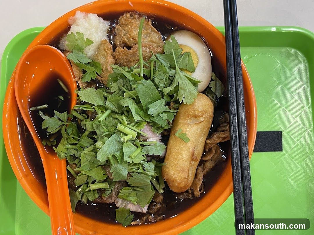 Bowl of Noodle Soup with Toppings