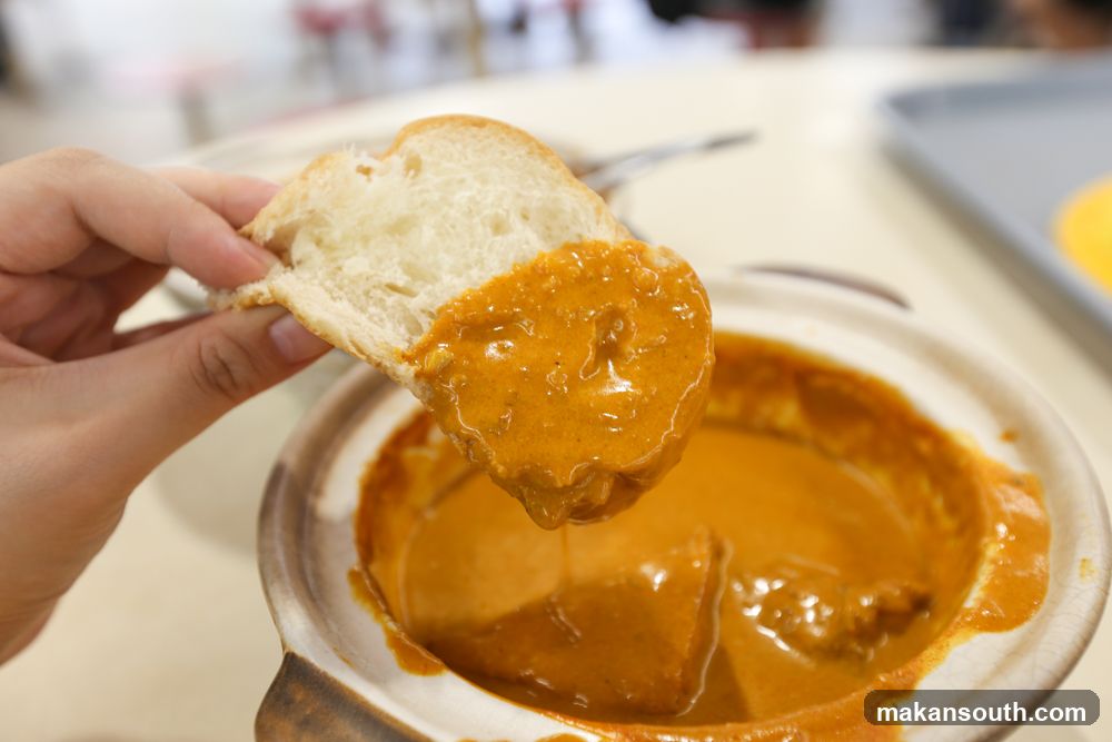 Dipping Bread in Curry Sauce