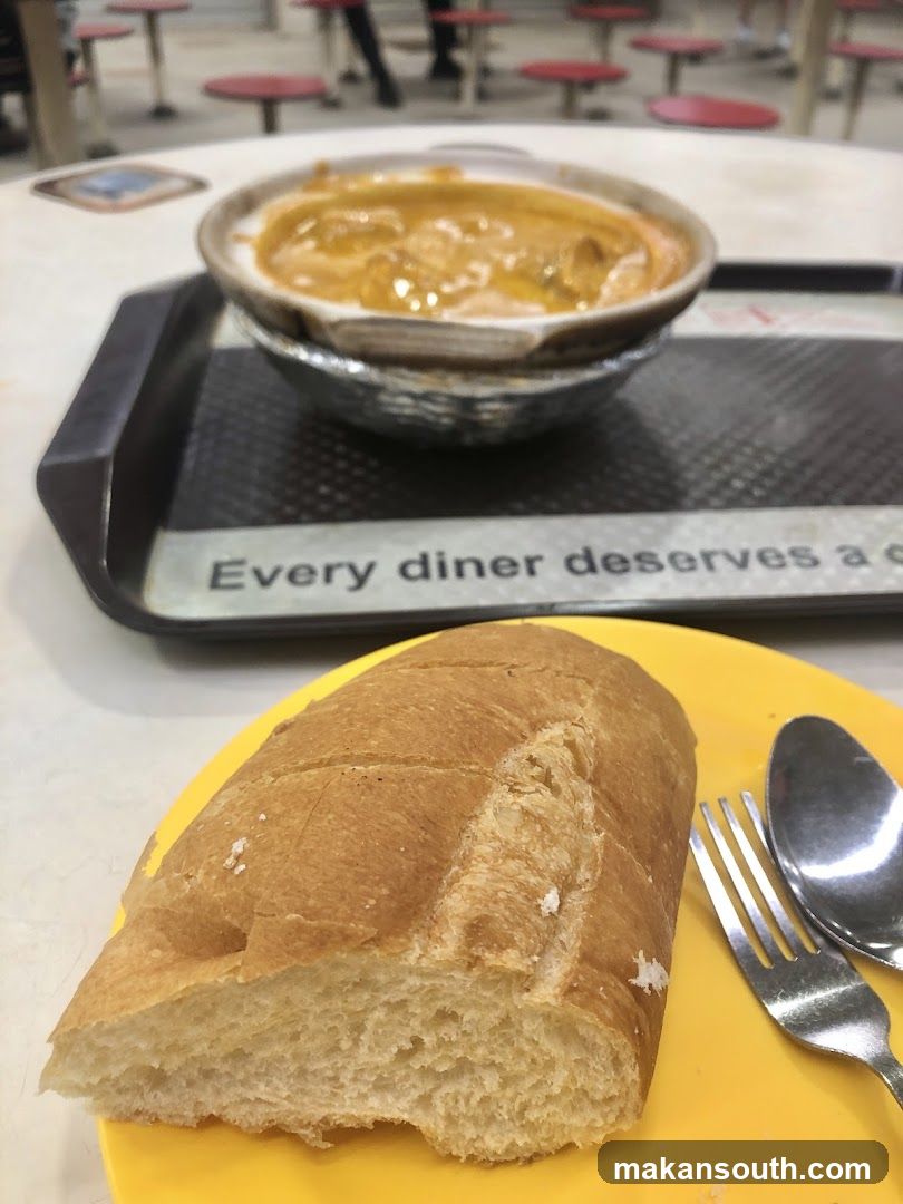 Diner's Meal with Bread and Soup