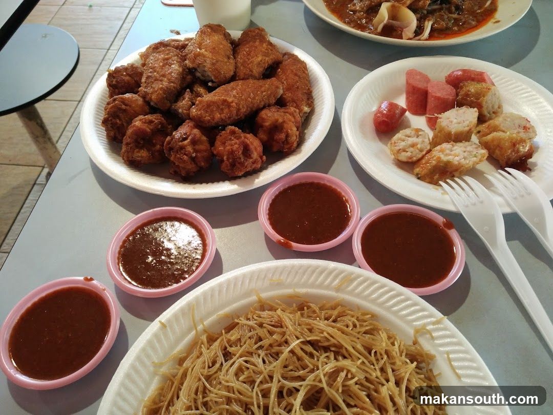 Food Spread with Fried Chicken and Noodles