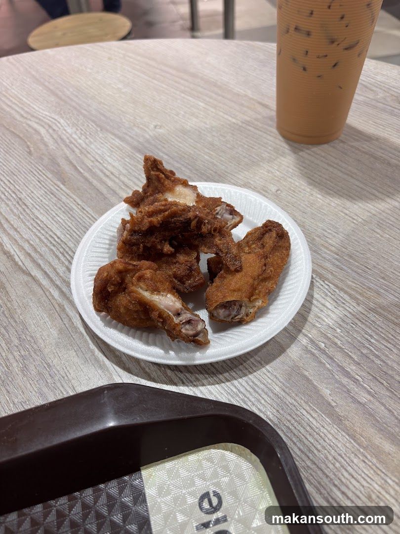 Fried Chicken and Drink on Table