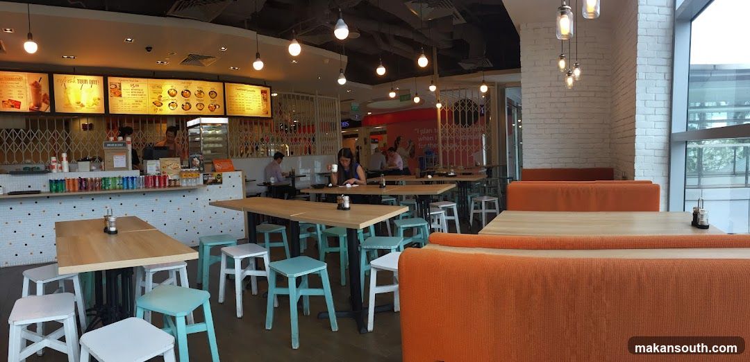 Restaurant Interior with Menu Boards and Seating Area