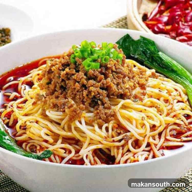 Spicy Noodle Dish with Minced Meat Topping