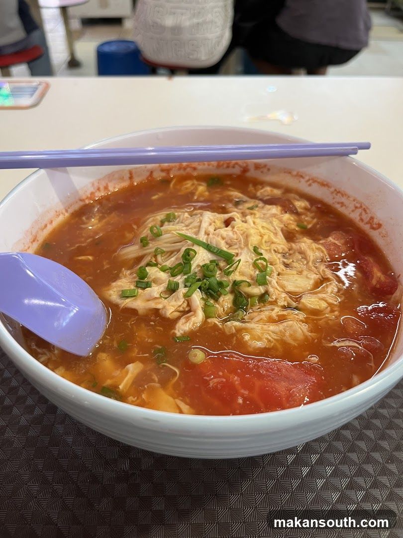 Bowl of Tomato Egg Soup with Chicken