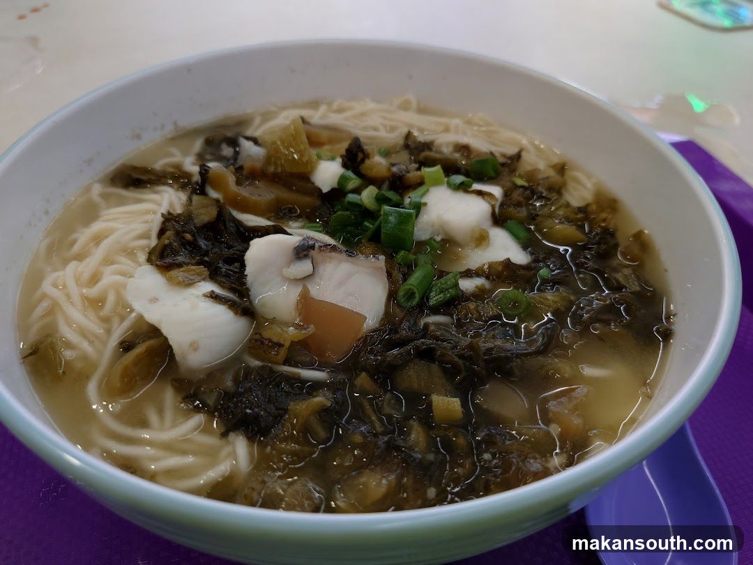 Bowl of Noodle Soup with Fish and Preserved Vegetables