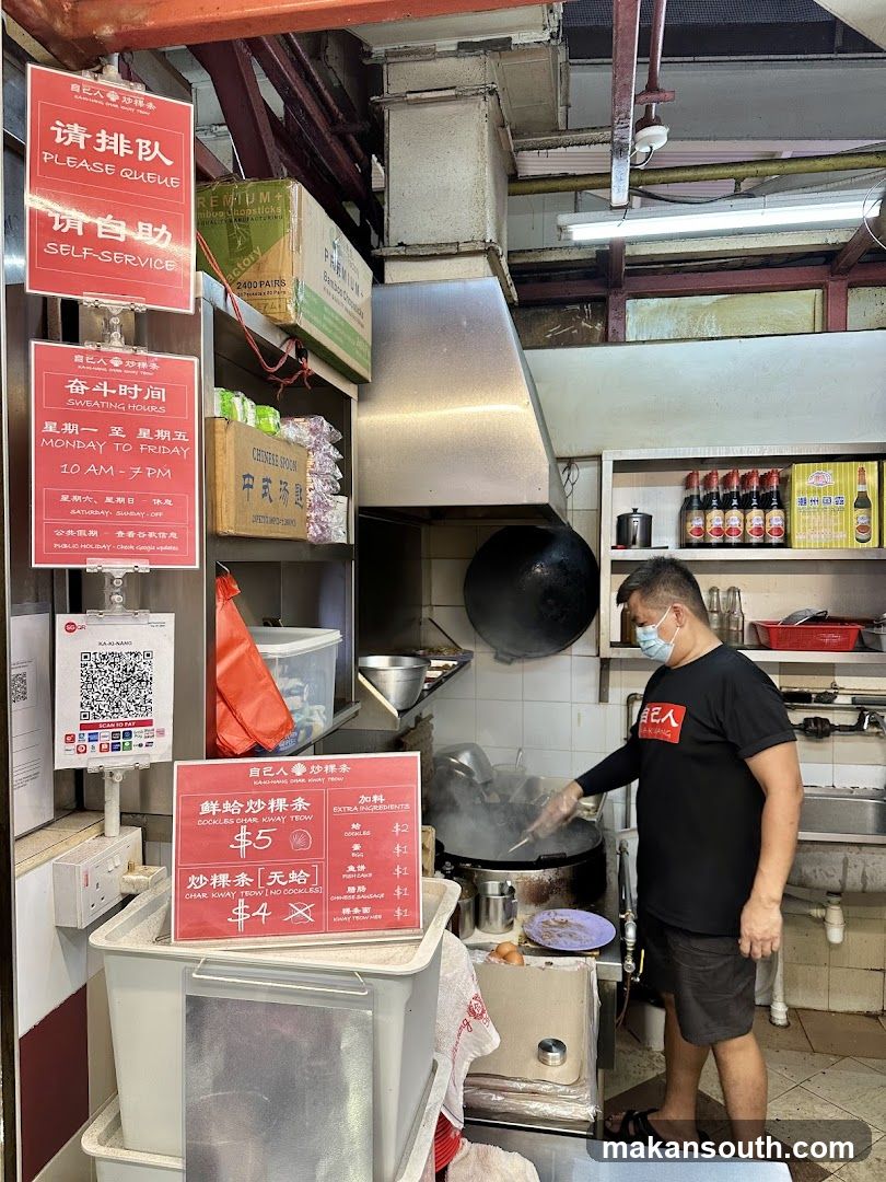 Kitchen Interior with Staff Cooking