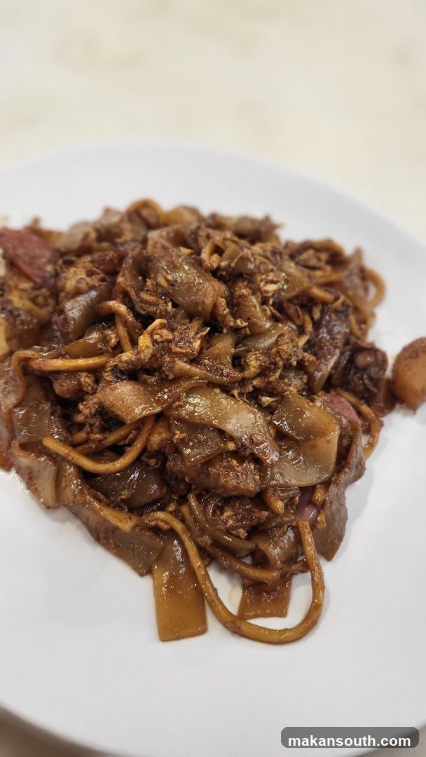 Plate of Stir-fried Noodles with Meat and Vegetables