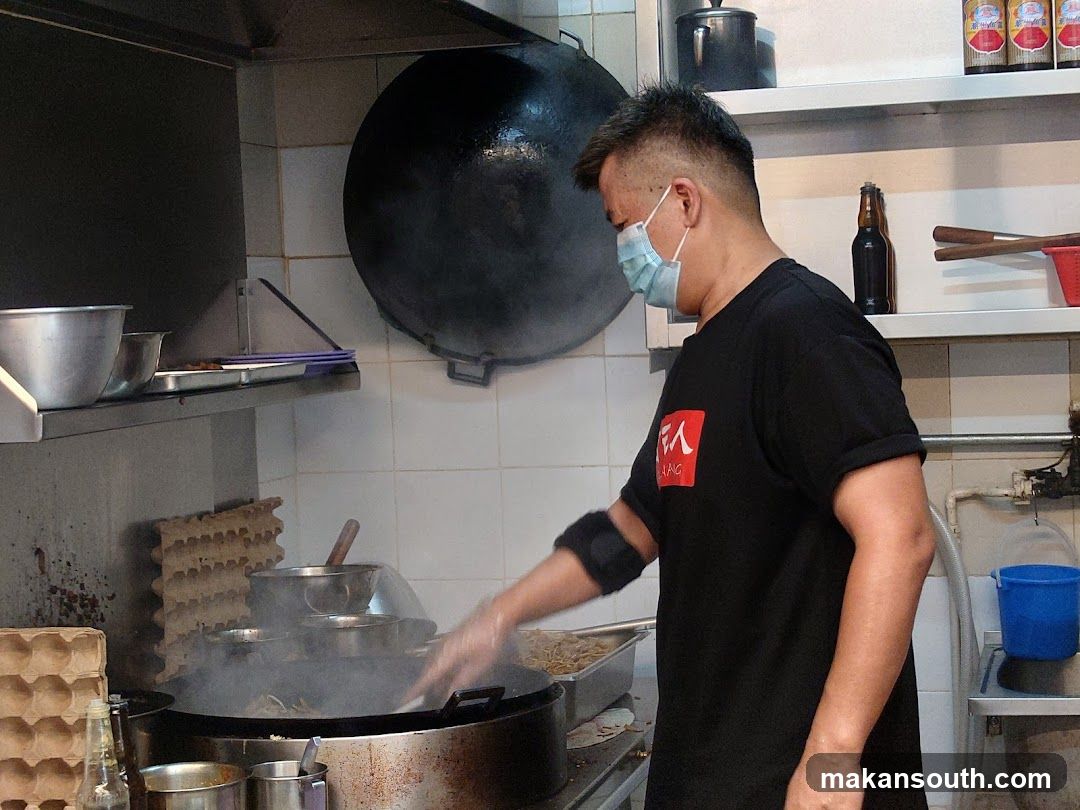Chef Cooking in Kitchen