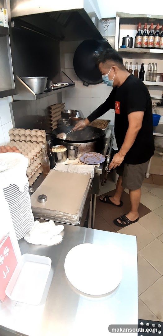 Kitchen Scene with Chef Cooking