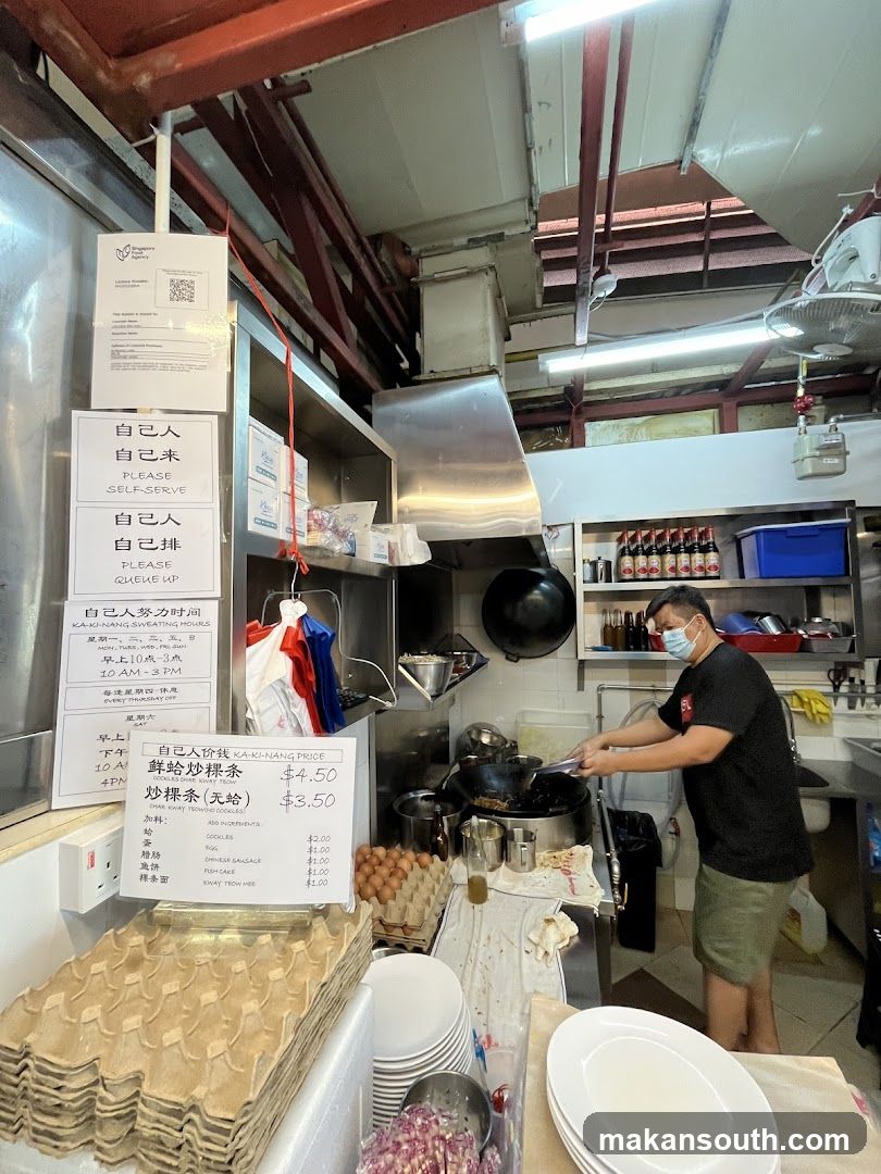 Kitchen Interior with Staff Cooking