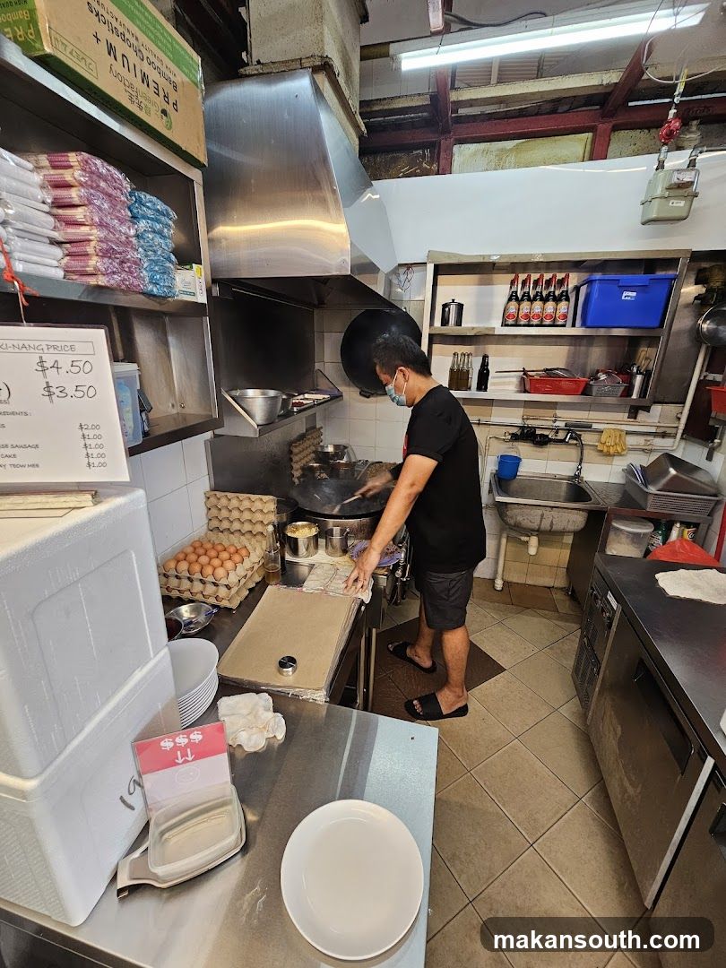 Kitchen Interior with Staff Cooking