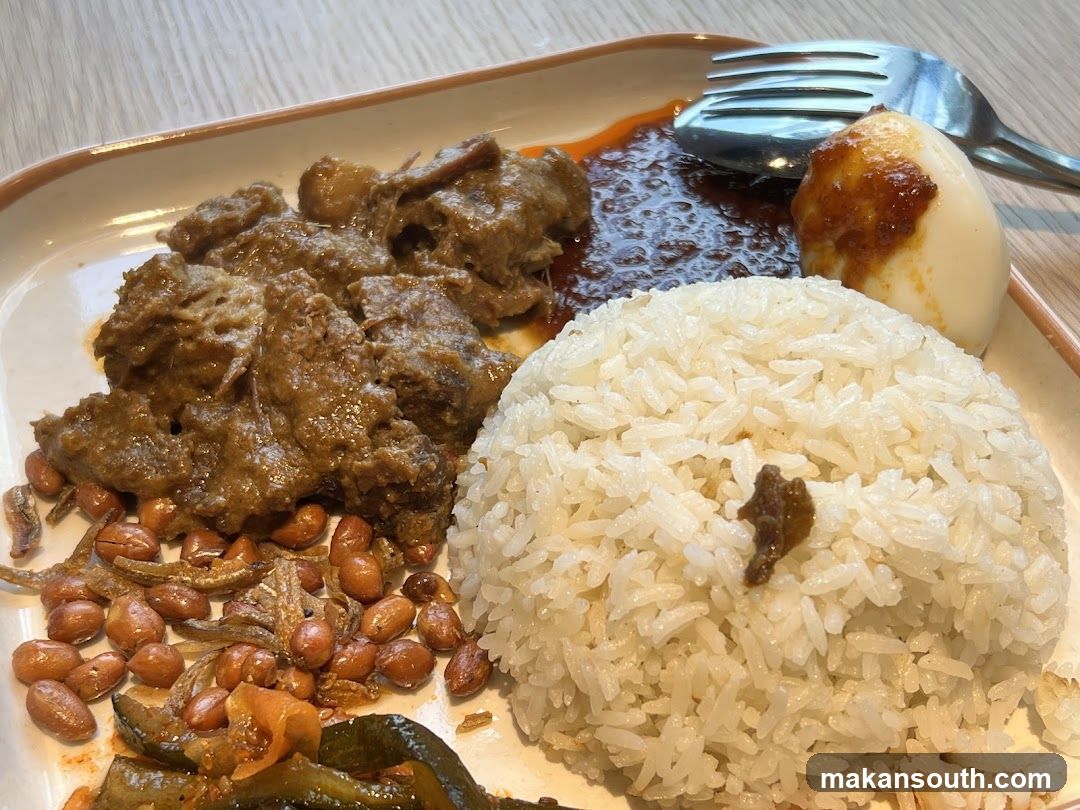 Nasi Lemak Plate with Curry and Fried Fish