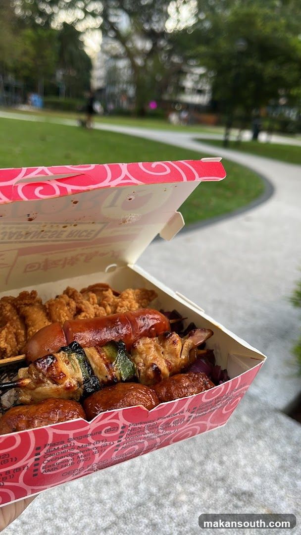 Food Box with Grilled Skewers and Fried Chicken
