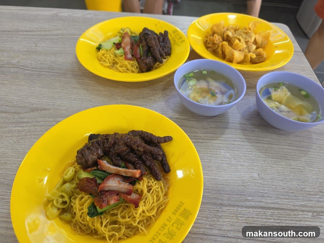Noodle and Meat Dishes on Table