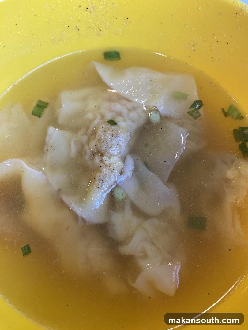 Wonton Soup in Yellow Bowl