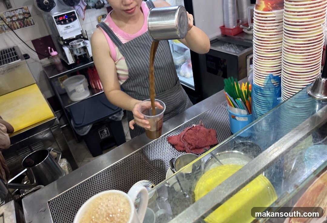 Beverage Preparation at a Food Stall