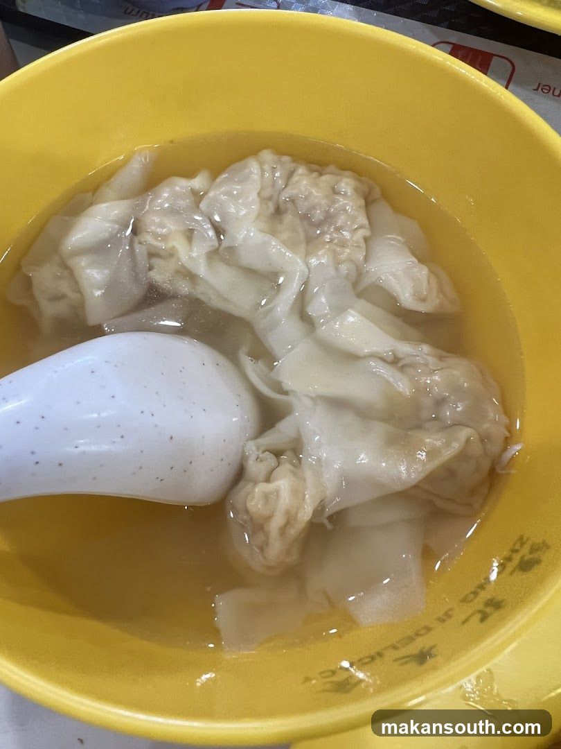 Wonton Soup in Yellow Bowl