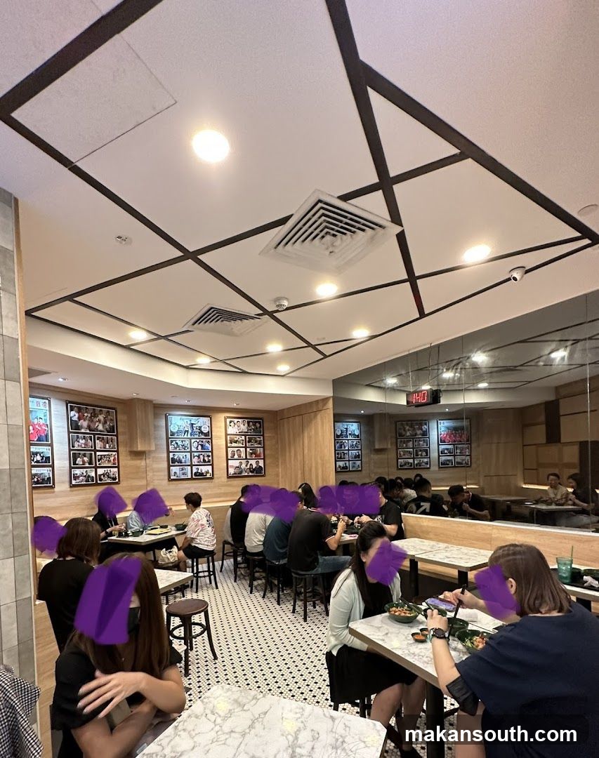 Dining Interior with Decorative Ceiling and Wall Displays