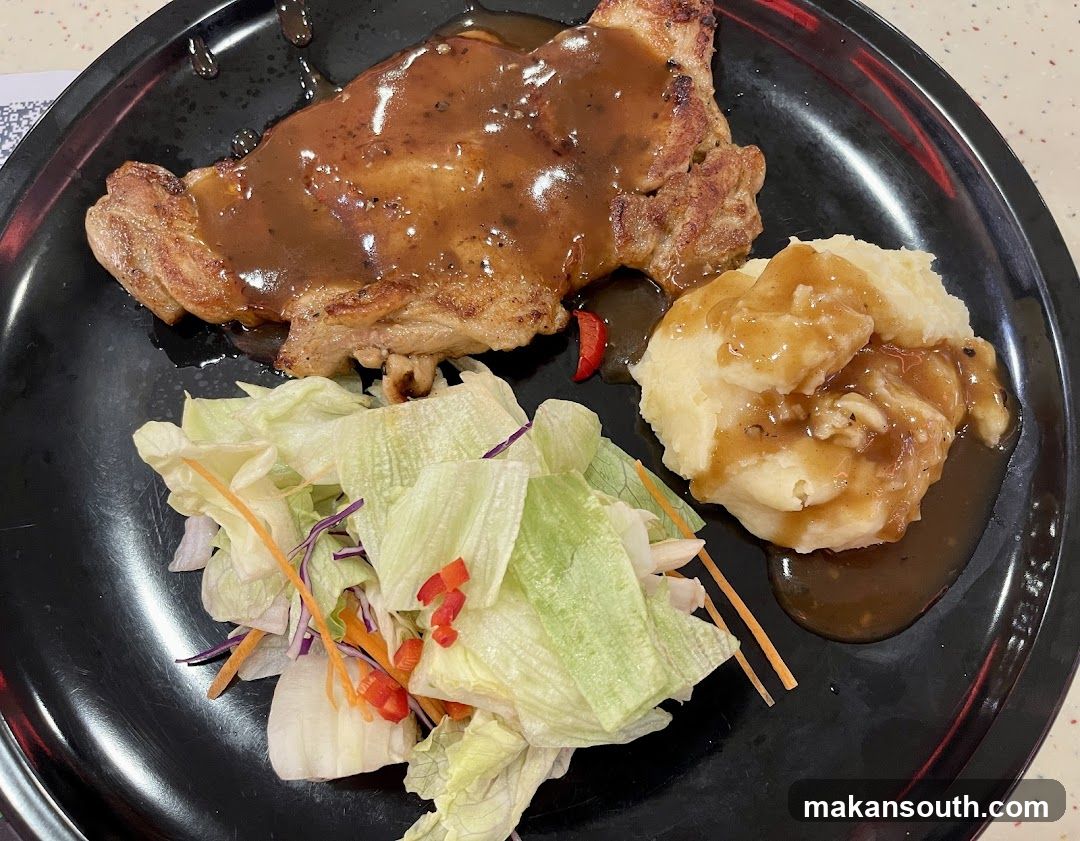 Pork Chop with Mashed Potatoes and Salad