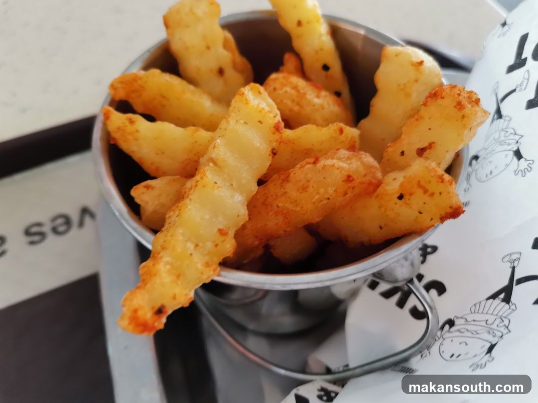 Crispy Crinkle Cut Fries in Metal Bucket