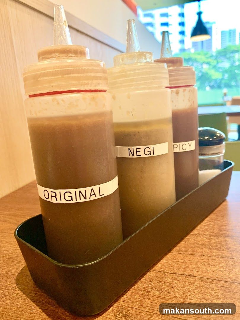 Condiment Bottles at Restaurant Table