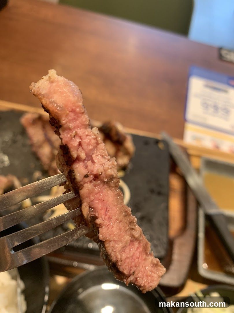 Steak on Fork at Restaurant