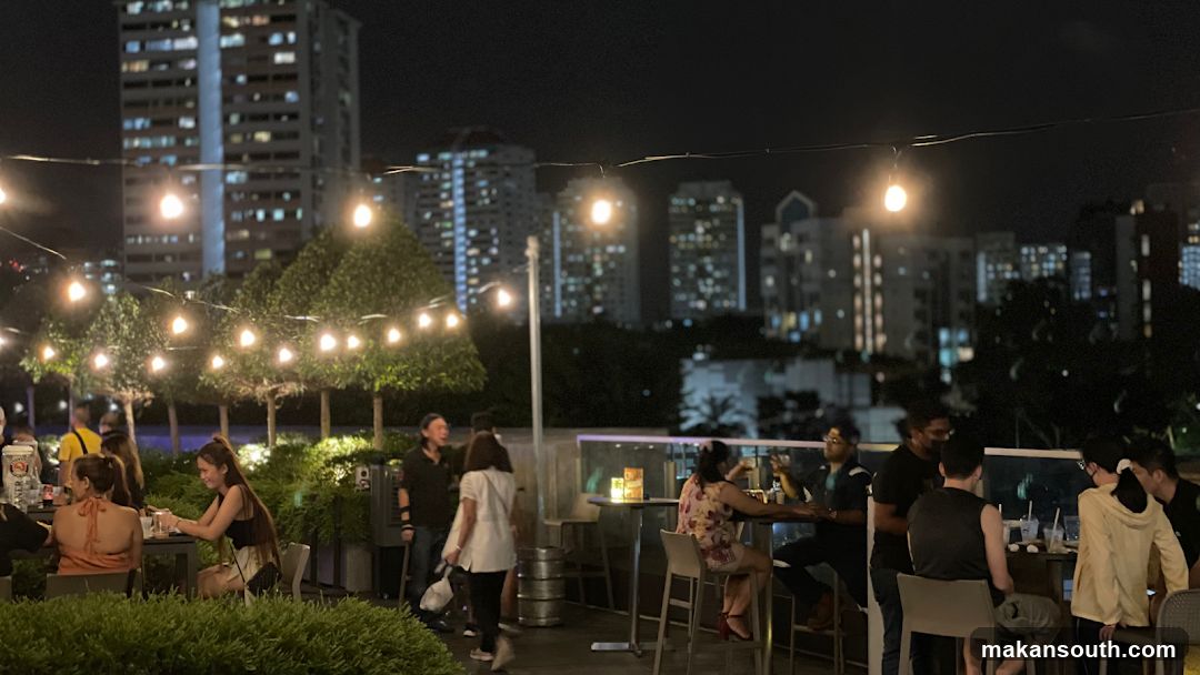 Night Rooftop Dining Scene