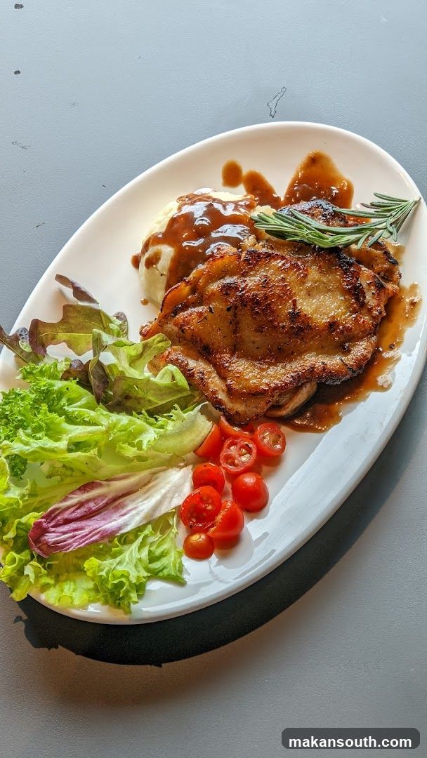 Grilled Pork Chop with Salad and Sauce
