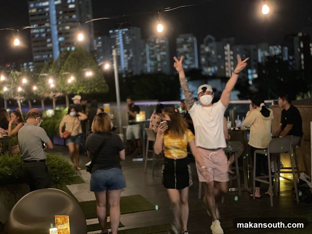 Night Rooftop Bar Scene