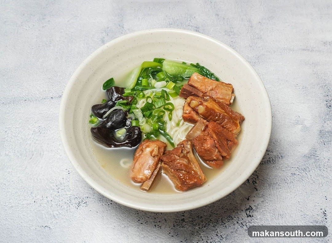 Bowl of Noodle Soup with Meat and Vegetables