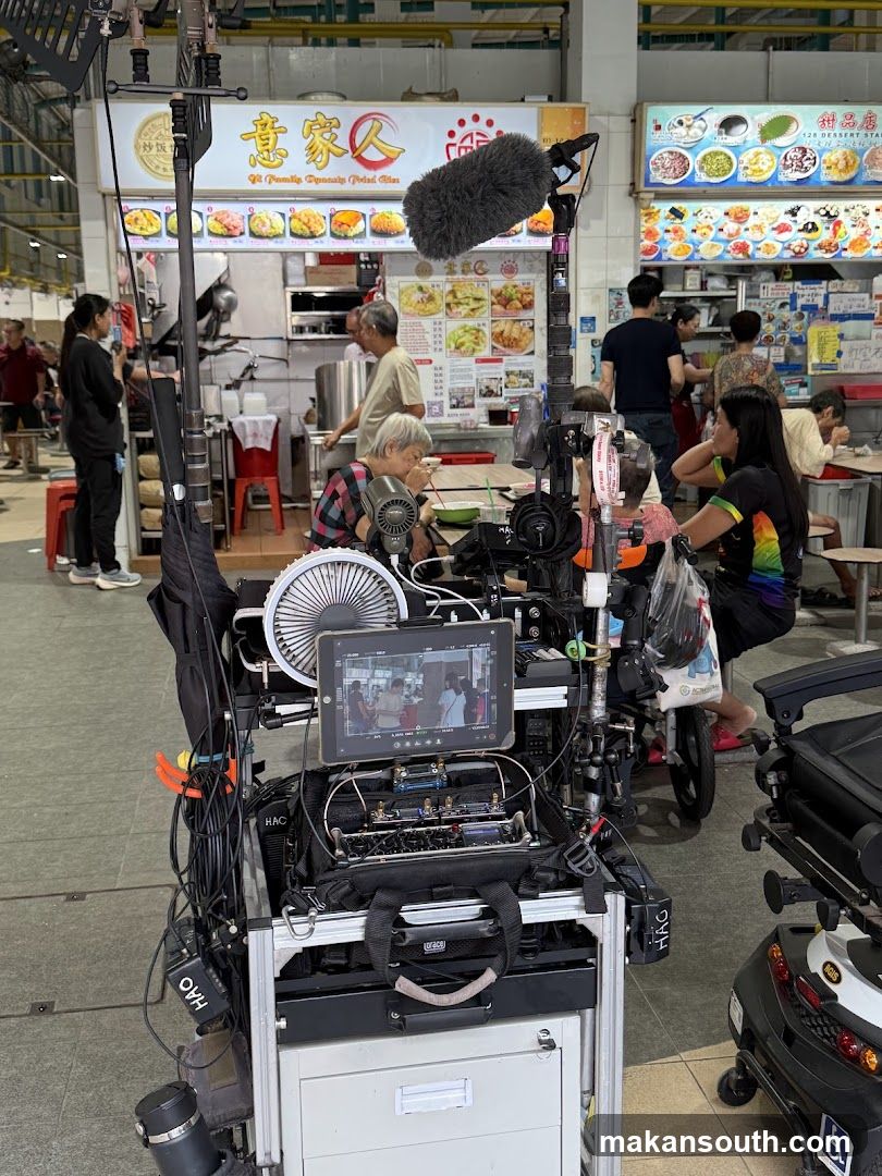 Food Court Scene with Filming Equipment