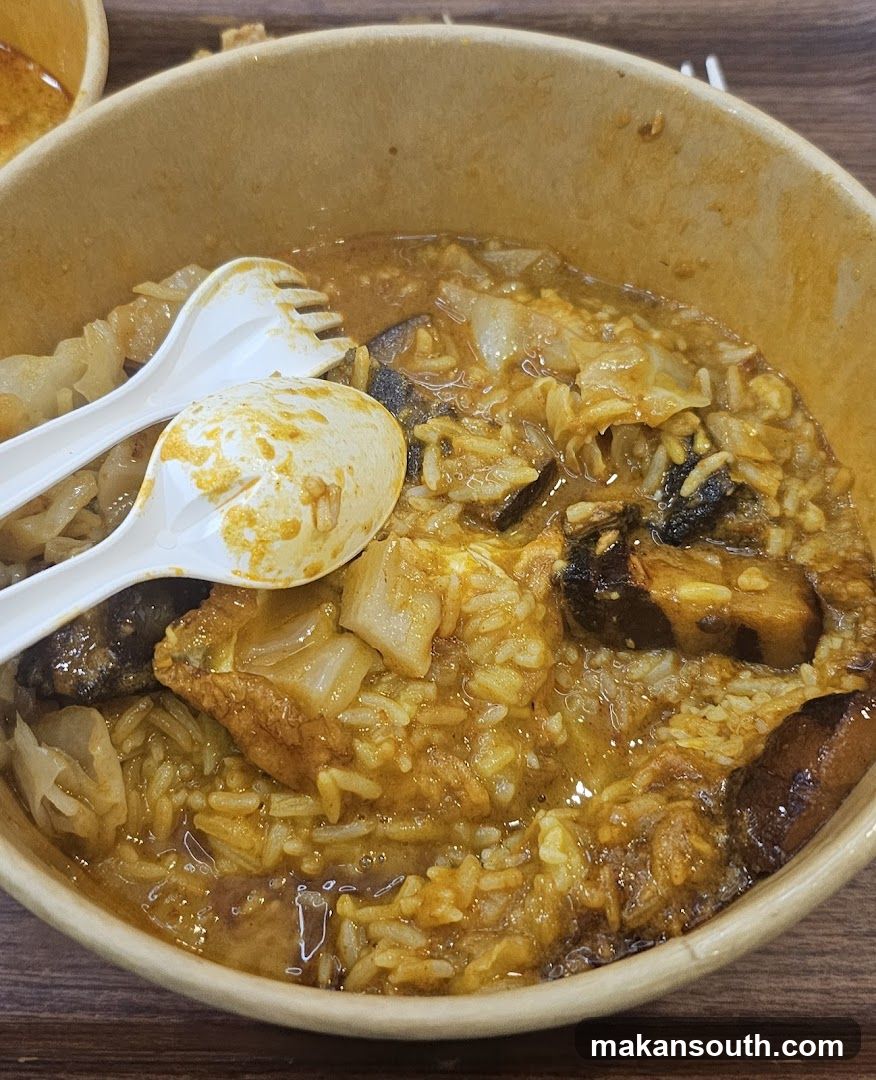 Bowl of Curry Rice with Vegetables and Egg