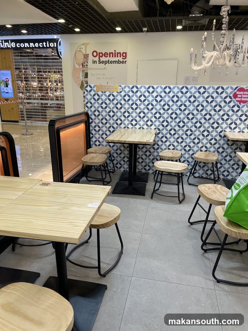 Restaurant Interior with 'Opening in September' Sign