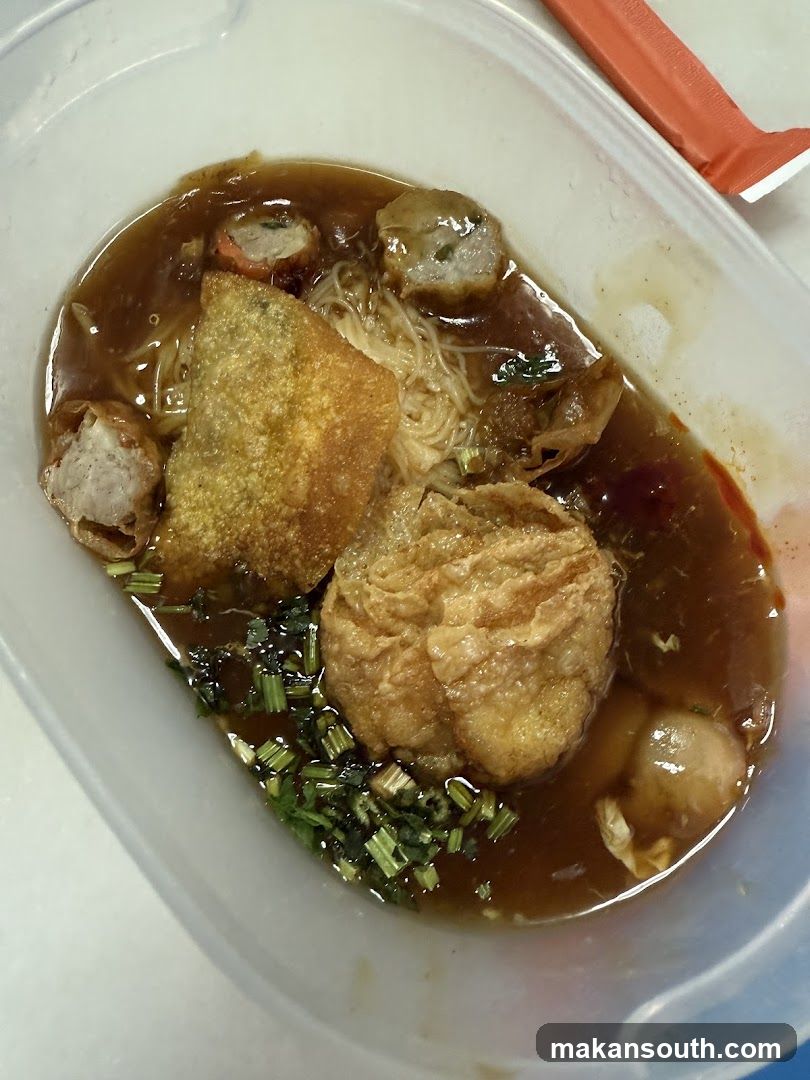 Noodle Bowl with Fried Dough and Meatballs