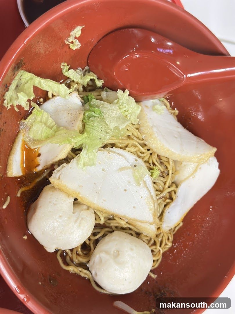 Noodle Bowl with Fish Balls and Lettuce