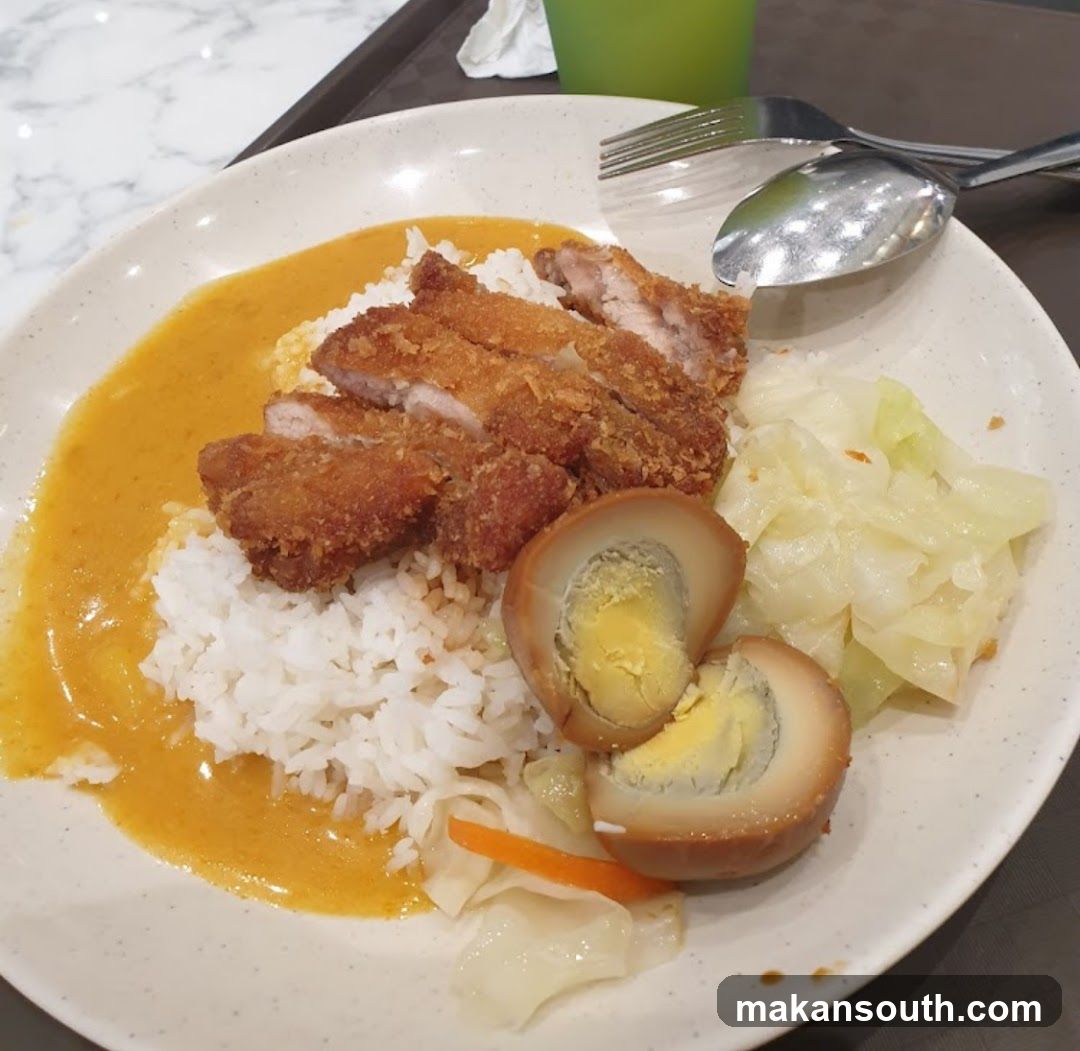Curry Rice Plate with Fried Chicken and Pickled Egg