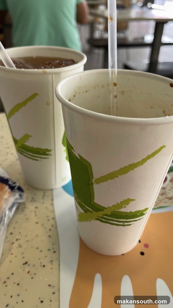 Two drinks with straws