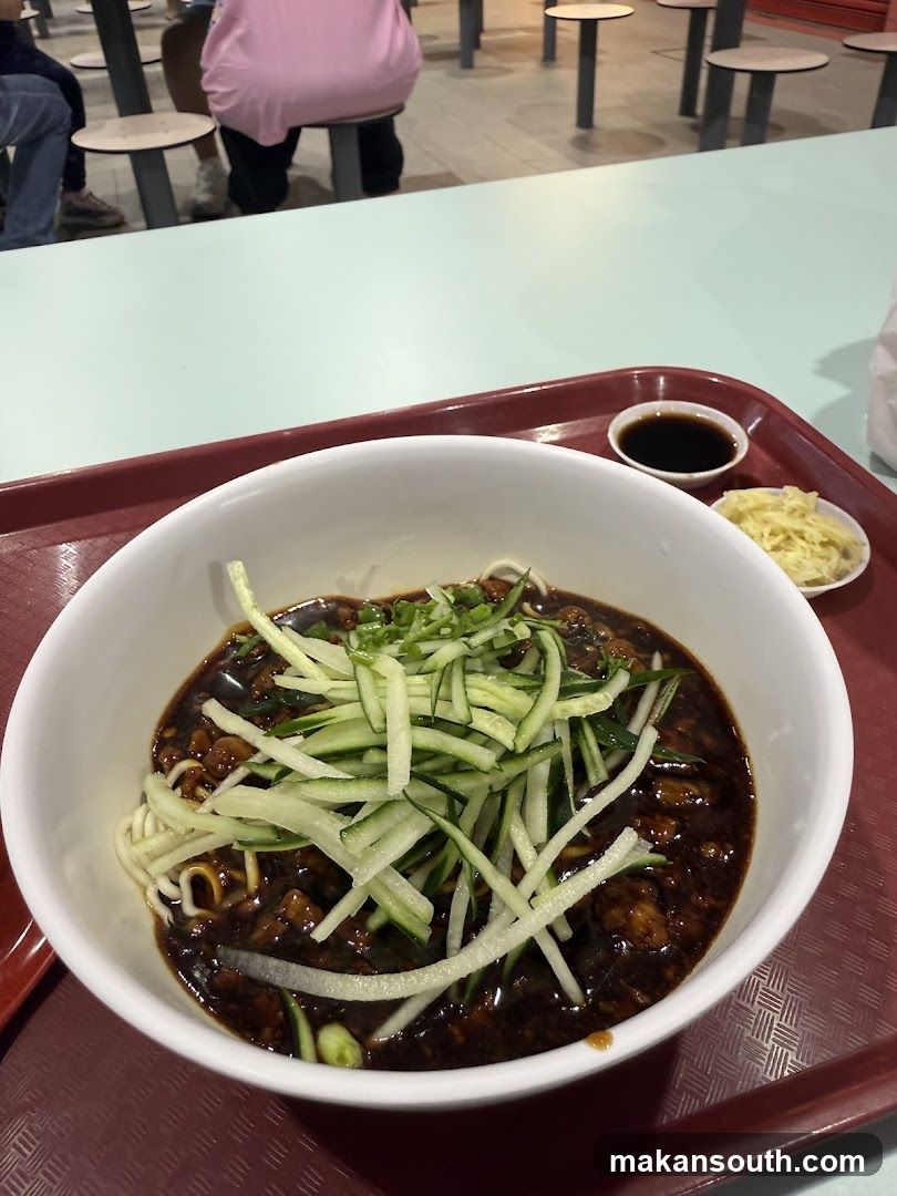 Bowl of Noodles with Cucumber and Sauce