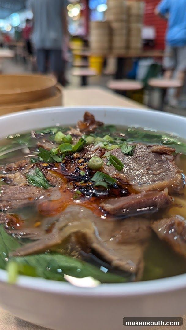 Bowl of Beef Soup with Garnish
