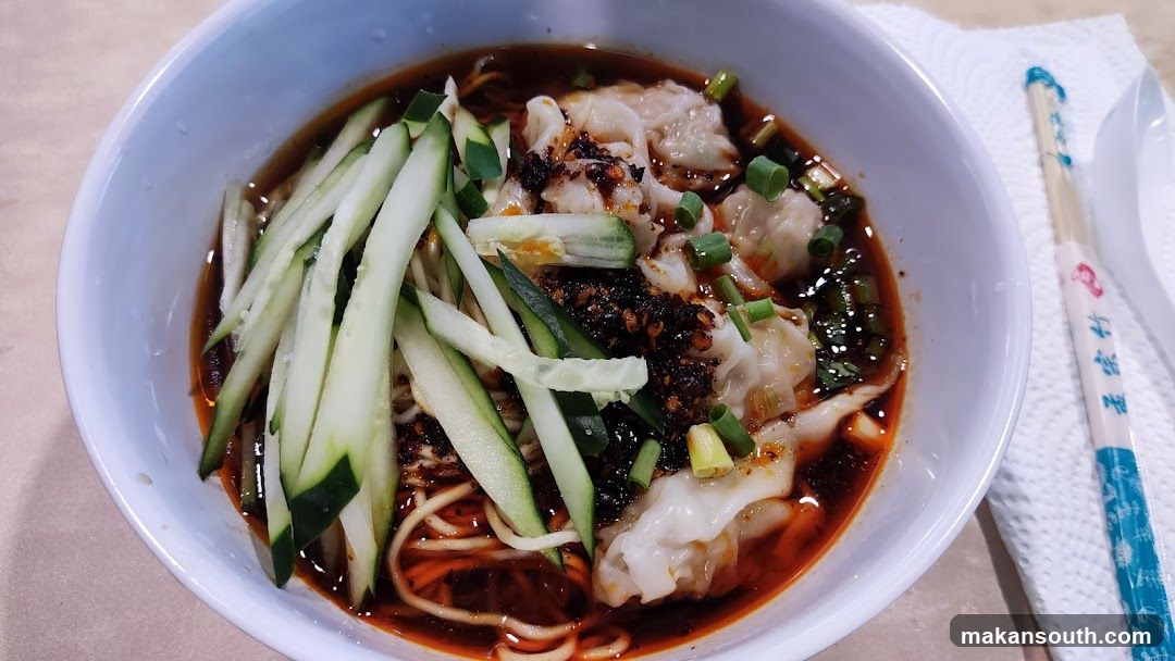 Spicy Noodle Bowl with Wontons and Cucumber