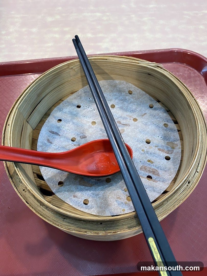 Steaming Basket with Chopsticks and Spoon